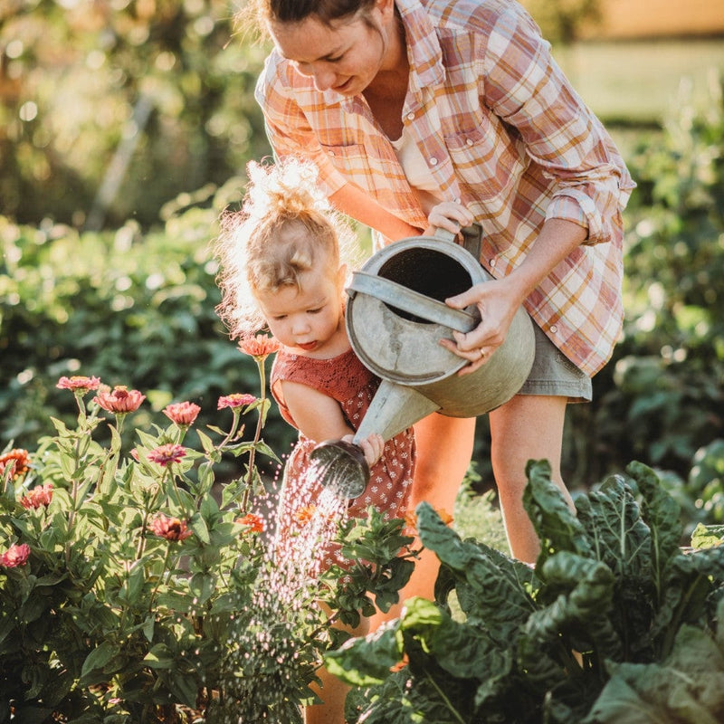 Girl watering flowers